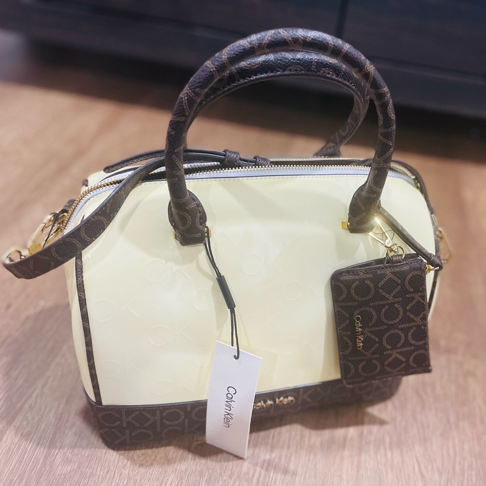 Ashley Embossed Signature Top Zipper Satchel